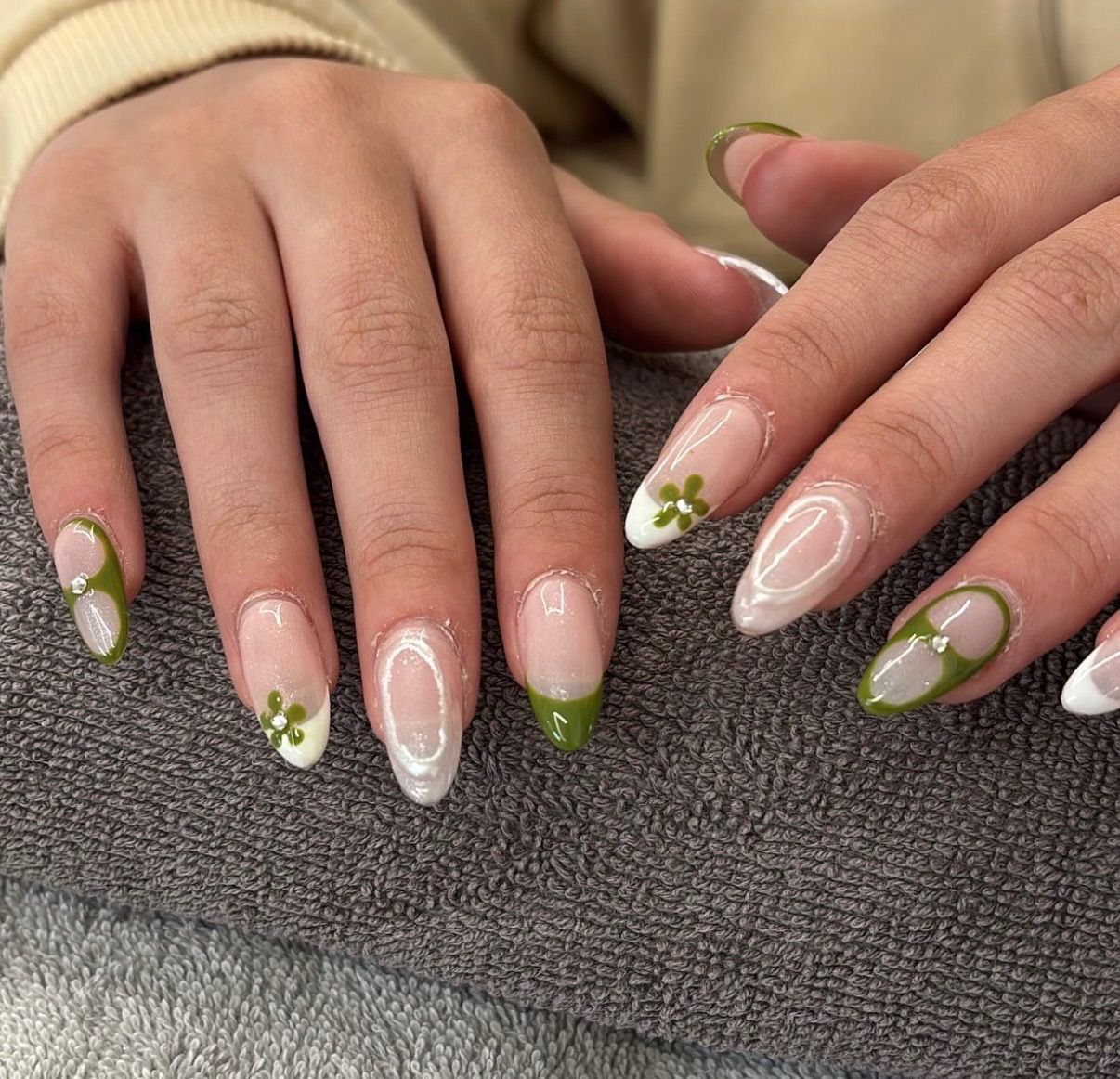 Green and white floral nail art